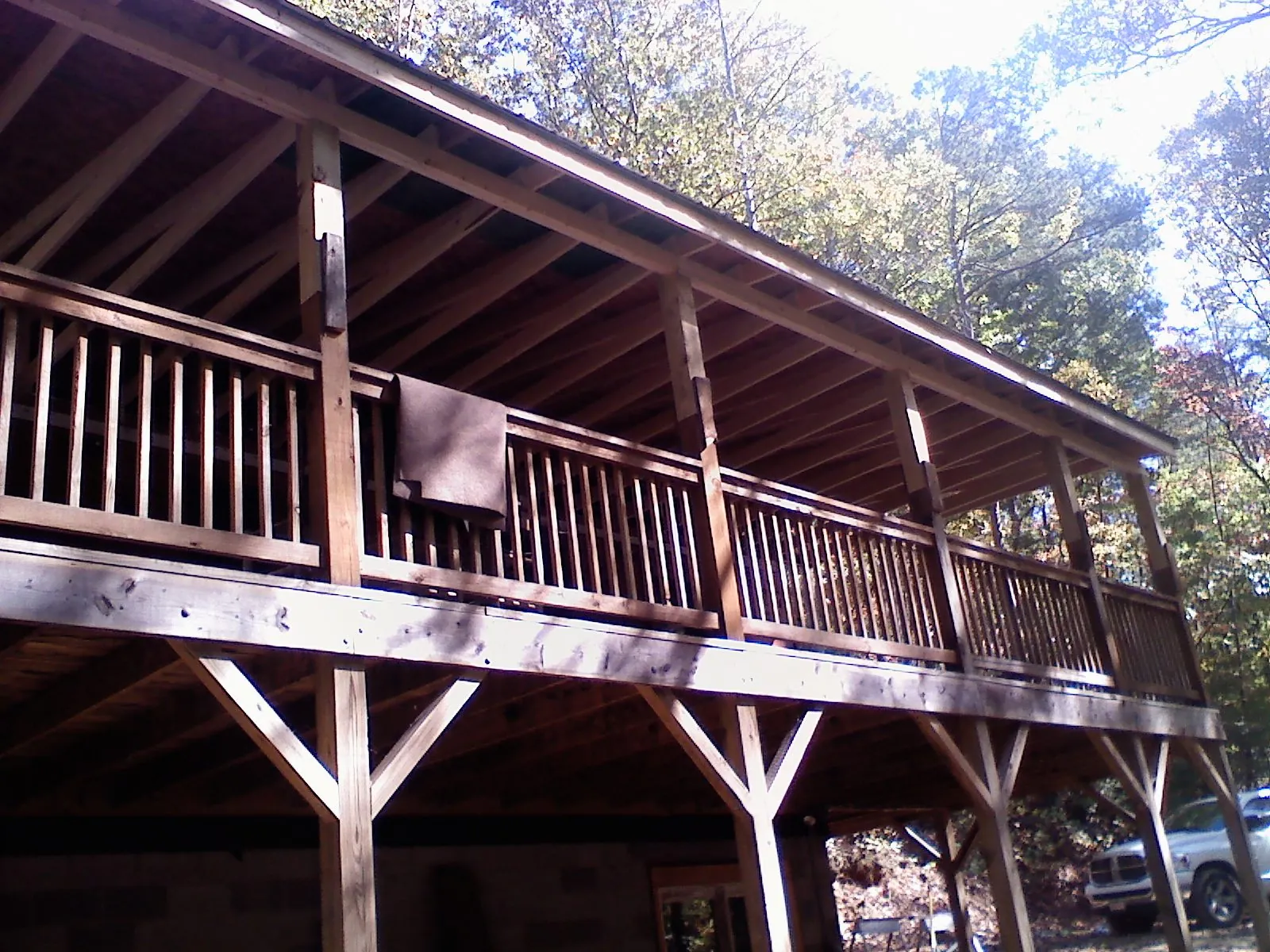 Timber framing under a new elevated porch and deck — Roof Leak Repair in Braxton by Roofing Brothers
